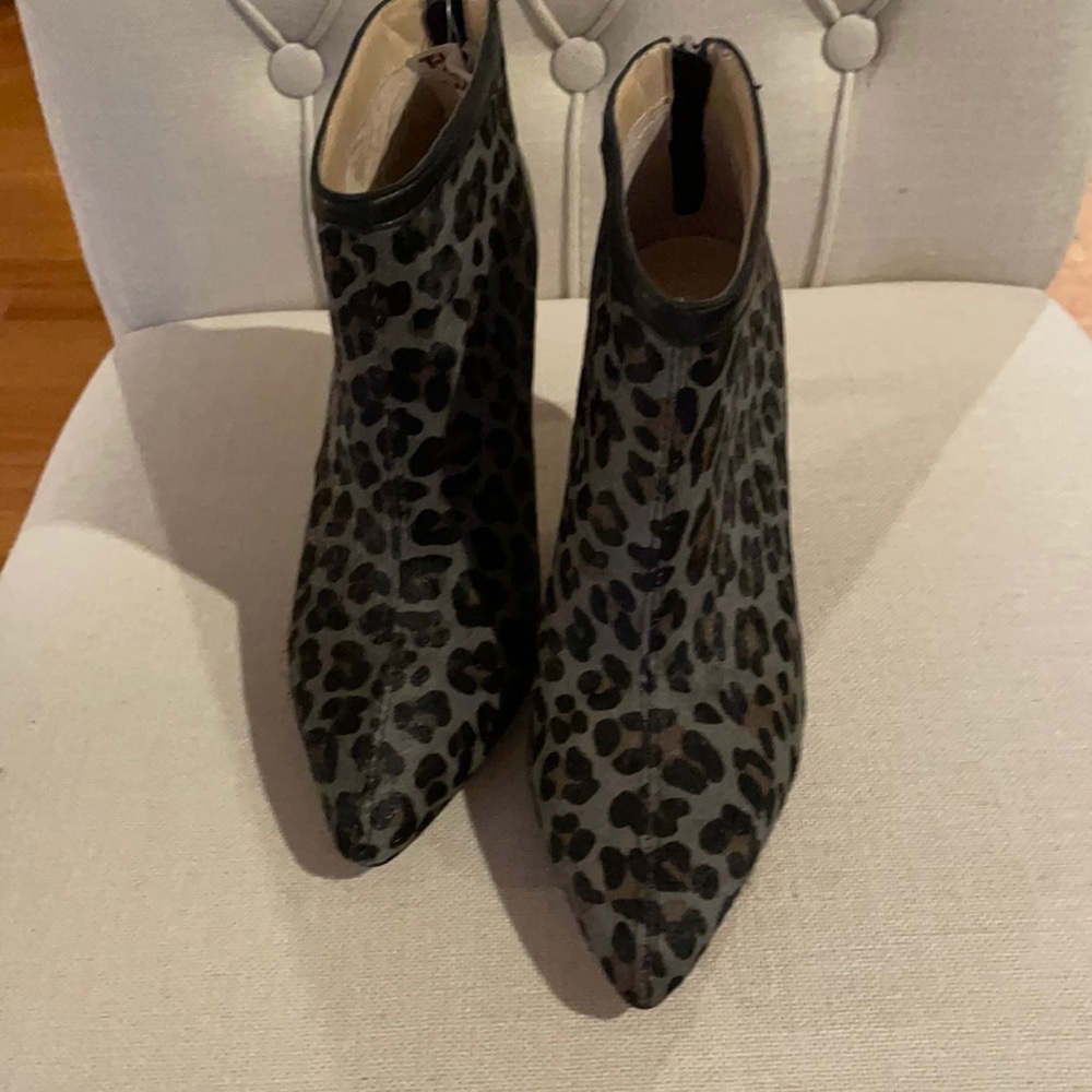 New without tags. Adrienne Vittadini heeled booties. Heel is 3 1/2 inches.